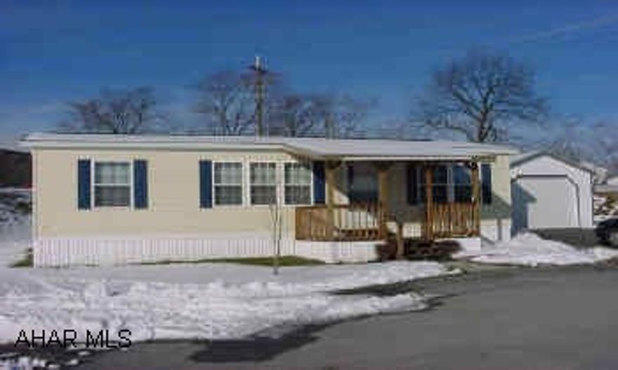 Very nice 2001 Champion Doublewide on spacious  rented lot on a culdesac. 3 Bedroom, 2 Bath, Oak Kitchen, Large Very Nice 2001 Champion Doublewide on Spacious Lot on Culdesac. 3 Bedfoom, 2 Bath, Oak Kitchen, Large Garage(14'x24'), Covered Front Porch.Lot rent $170/Mo..