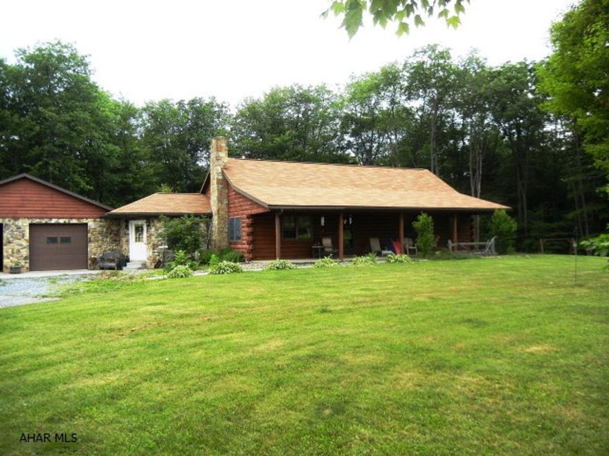 Private setting on approximately 4 Acres.  Close to RT 164 & RT 22.  2nd Floor could be finished.  Property is being sub-divided.  Nice log home with attached 2 Car Garage.