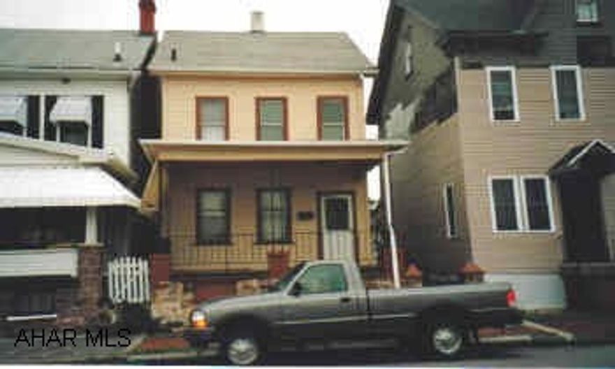 2 story with finished and heated attic. House newly painted with updated wiring and fenced in yard.