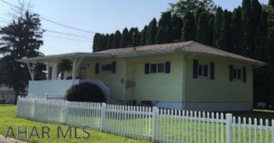 Very well maintained, 3 bedroom, 1 bath ranch home.   Updated with new roof and central air and furnace.  Lovely covered porch, great for entertaining, large basement could be finished, toilet in basement.  Lovely corner lot, fencing for privacy.  Off street parking.  This home is immaculate and move in ready.  The bedrooms and bath and kitchen have updated flooring. This home is a must see!