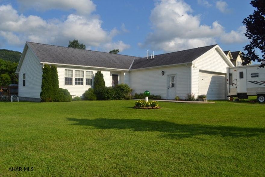 LARGE PRICE REDUCTION ON THIS MOVE-IN READY HOME! This 3 BR, 2 BA spotless single story is the definition of a home well-maintained by its original owners.  It includes a large open living & dining room area, which conveniently leads to a relaxing screened-in back patio which is sure to get much use.  The eat-in kitchen is very spacious & incls all appliances. Master w/private full bath. Home also has a 2 car garage, central air, shed, large yard that has a fenced area & beautiful view, as well as a back deck & pool to be used on those sunny summer days we will be dreaming about this winter.  It is perfectly ready to move right in & the best part?  It is all on one floor which makes it ideal for all ages. Home inspection has been completed & is on file.