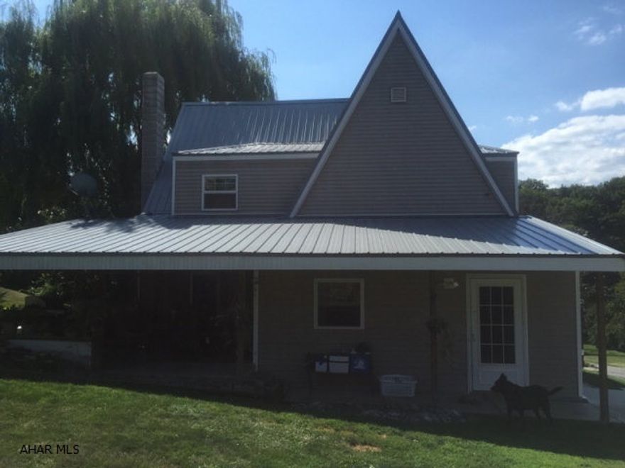 Beautiful home with newer gas furnace, roof, siding, windows, insulation, updated kitchen and bathrooms. Hardwood floor under dining room and living room carpet.  Corner lot with detached garage with mother-in-law, one bedroom apartment, over garage. Apartment has water, electric and heat. Price based on appraisal.