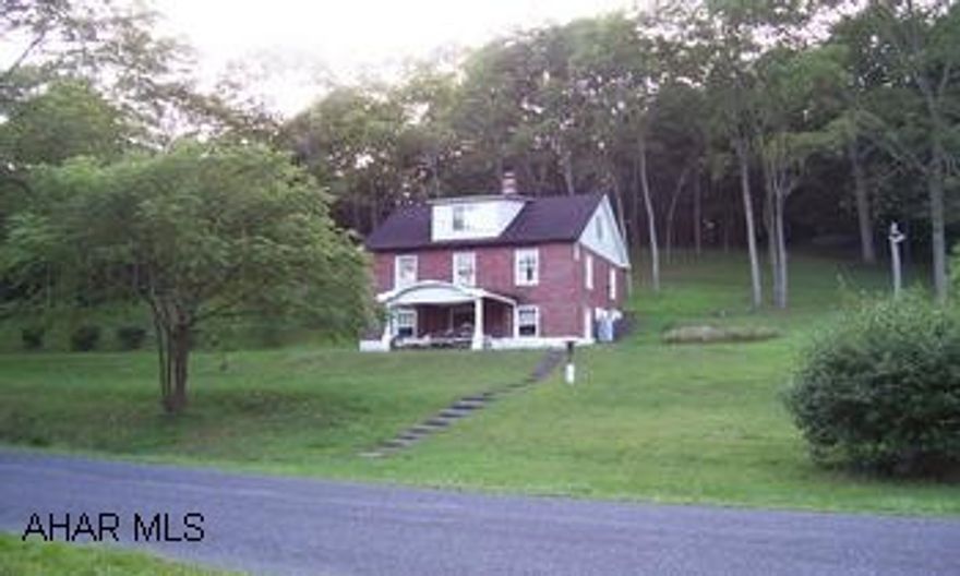 A hunter's paradise with the original brick homestead.  Wildlife galore with bear, deer, turkey, and squirrels.  The property adjoins the Raystown Branch of the Juniata River which offers plenty of fishing and boating.