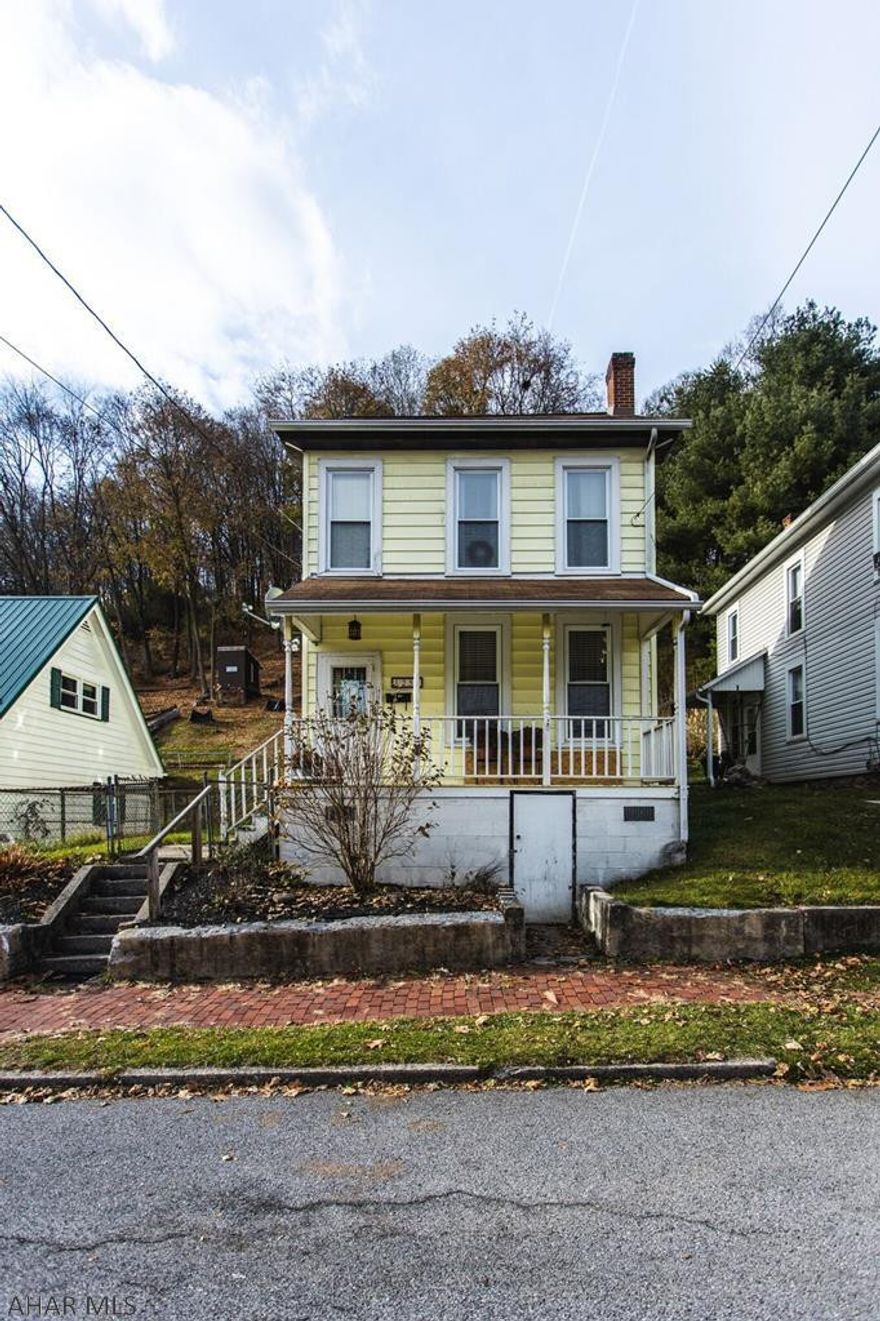 Nice 4 bedroom, 1 bath house with front porch and backyard.