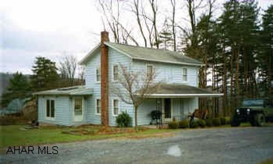 2 story blue/gray house Move in condition. Beautiful oak kitchen. Private area walk to the woods.