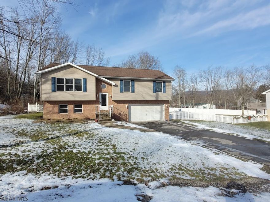 Charming 3 bedroom in Bellwood School District. This home offers great entertaining space and nice sized bedrooms. The kitchen opens to the living room and back deck. Having a partially finishing basement is great for additional living space or hobby room and 2 car integral garage. Add your final touches to make this house your home.  Call for more information or your private showing.