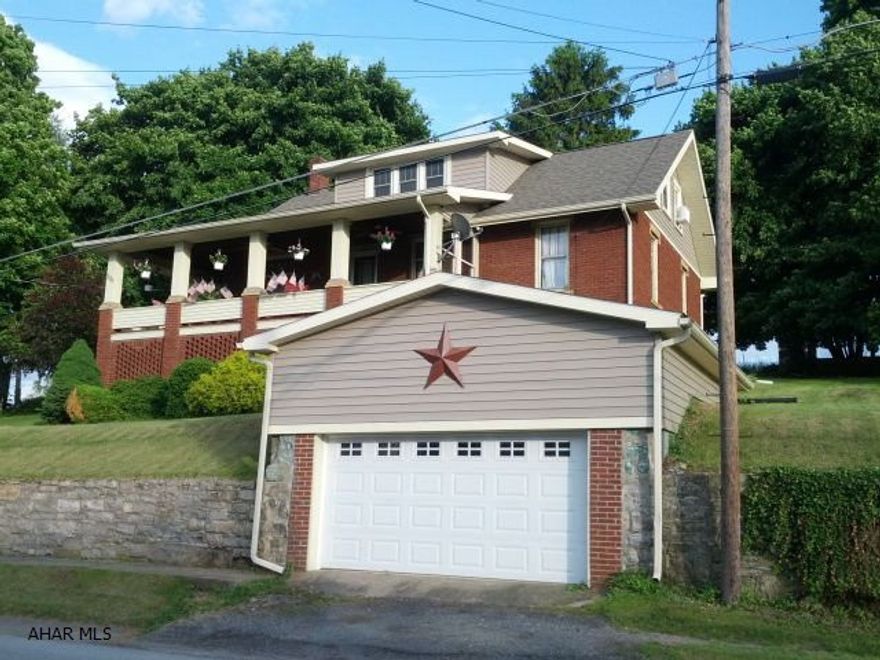 Beautiful country 3 bedroom brick home with modern kitchen with corian counters and moveable island, modern bath, wraparound porch, 1 car garage, 200 amp breakers and wiring in 2009, new shingle roof in 2011.  #J-255