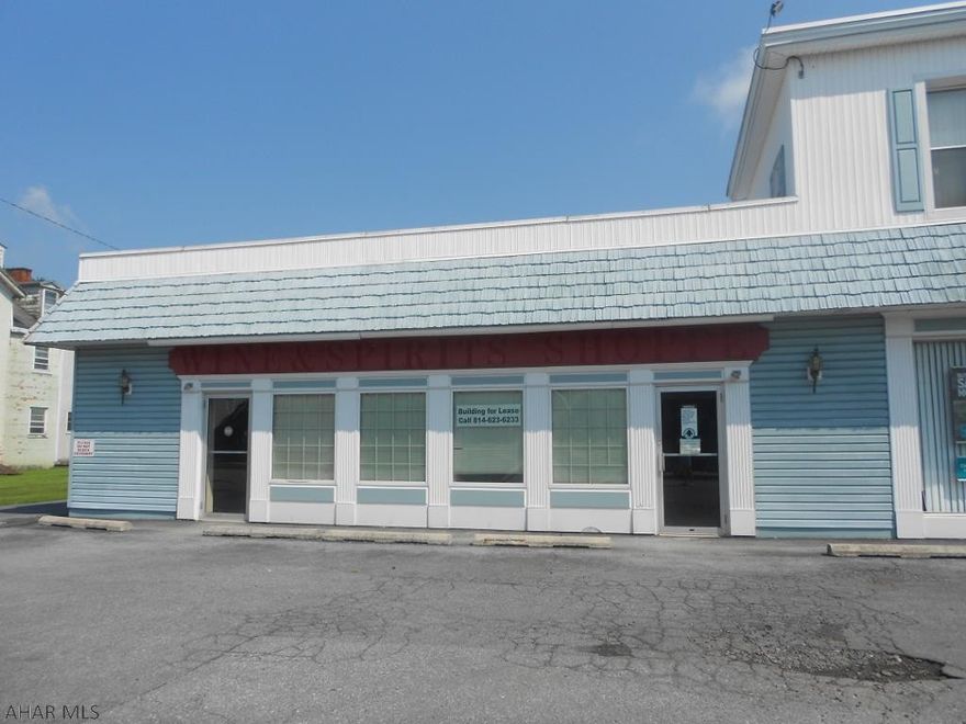 2700 sq ft of retail space available. Multi uses for $1000/month that includes water, sewer, garbage. Parking spaces available. Great deal!