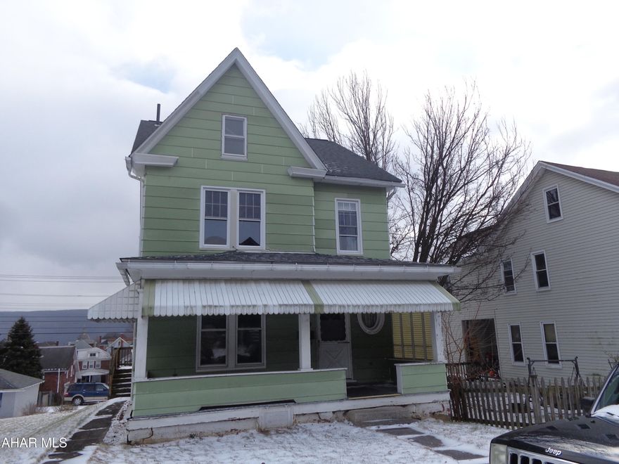 Cold weather--HOT BUY!  This home has a surprisingly spacious feel.  Mostly all original woodwork and pocket doors.  Plenty of kitchen cabinets and counterspace.   There is a nice sized lot that is 50 X 120, deck.  1st floor laundry & 1/2 bath.