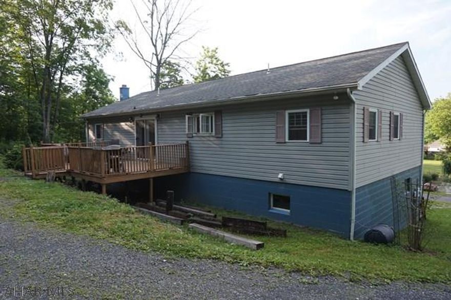 Many nice updates to this 3 bedroom, 2 bath raised ranch on 2.01 acres. Cathedral ceilings throughout. Master bedroom with master bath. Large oak kitchen. Attractive decor. Private setting. Spacious level yard out front. Call listing agent to see this great property! Hollidaysburg schools.