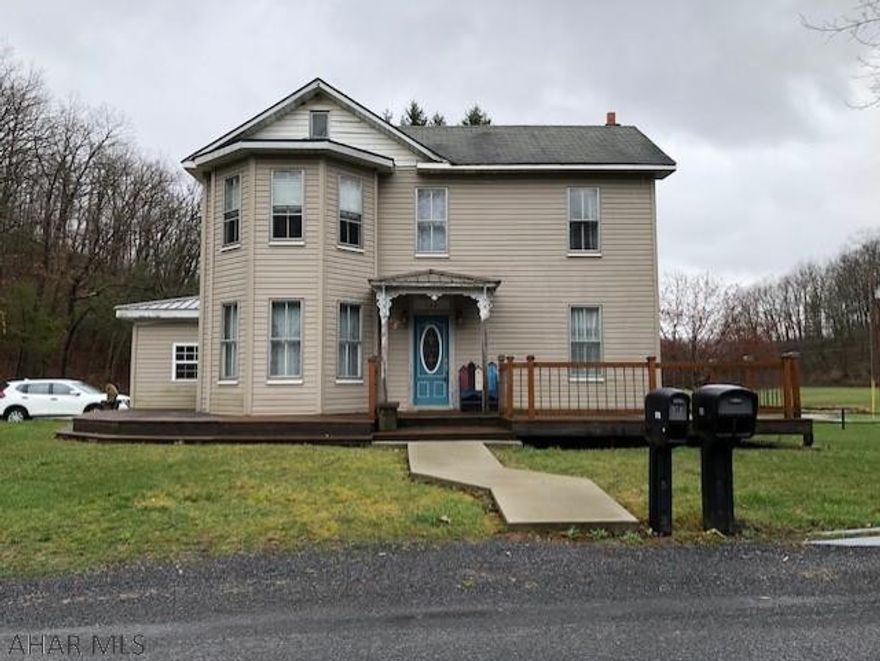 4 bedroom, 1  bath home on almost  acre.  Tons of character, numerous updates, beautiful living room, tons of space.  Outside has a stream and flat yard.  Newer room, some new windows, and new doors.  Deeded shared well.