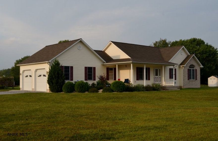 Beautiful move-in ready ranch on a large level(1 ac.)lot.  3 BR & 2 bath w/open floor plan.  Updated oak kitchen w/breakfast bar. Large rear deck to grill on is handy to dining/kitchen. Large Master BR with walk-in closet and beautiful Master Bath. Covered front porch  with views of Blue Knob.  Finished family room in the basement with spacious storage area & extra closets. Waterproofed basement. Very low utility costs. Wonderful attached 2 car garage just steps from the kitchen. Two storage sheds on the property. Professional landscaping with tons of potential for for gardening. 5 miles from I-99 and the turnpike. Close to Chestnut Ridge Schools, Blue Knob, and Shawnee State Parks.