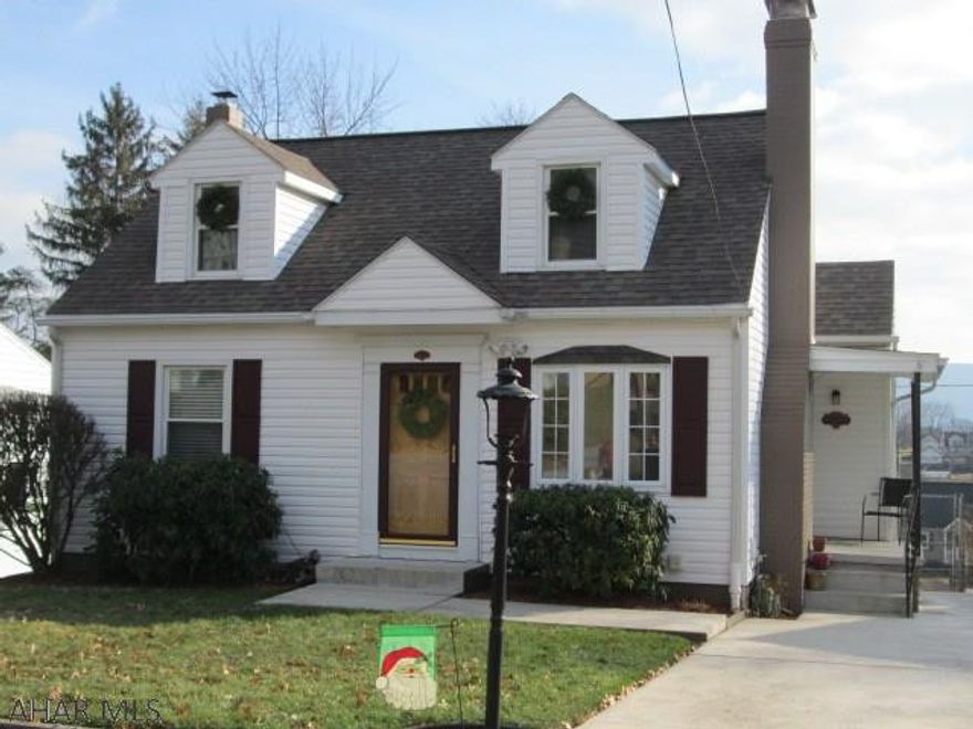 Quiet area near Beverly Hills.  Totally remodeled 3 bedroom Cape Cod style home.  When you enter the side entrance you will notice a totally new kitchen that features custom made cabinets with soft close hinges and all newer top of the line stainless steel appliances.  The unique tile flooring accents this beautiful kitchen.  The cozy formal dining room has a gas log fireplace and beautiful hardwood floors.  The two first floor bedrooms have hardwood floors and are separated by a newer full bath.  The second floor is a large bedroom complete with walk-in closet.  The lower level of this home is a "must-see"!  It comes complete with wood stove, surround sound, tap system, 1/2 bath and is a walk-out!.  The rear patio features a Pre-Way fireplace, overhead speakers and natural gas grill.