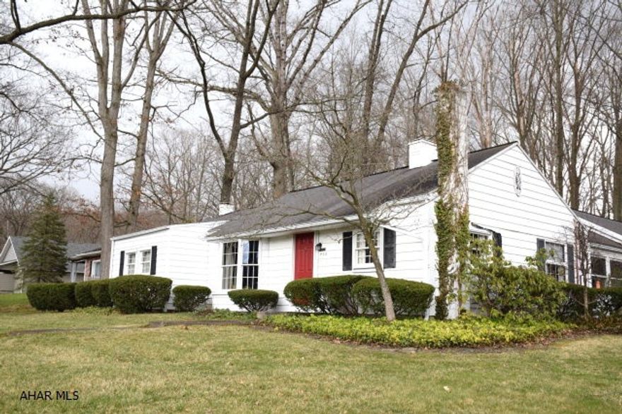 Such a unique opportunity in Tyrone!  Very nice ranch style home with 3 BR, 1 BA. Large living room with built-in bookcases and cabinets and pretty bay window.   Enclosed breezeway and one car garage.  In addition, this home has a lovely 2 bedroom apartment.  Perfect for first time buyers to help pay the mortgage, or for downsizing baby boomers with elderly parents to look after. This one-of-a-kind property is located on a nice corner lot and offers tons of curb appeal.