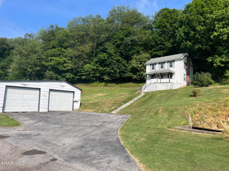Two story vinyl sided 3 or 4 bedroom home on slightly over an acre lot. The home has 2 baths, separate laundry room with washer and dryer included, nice sized living room and oak kitchen.  Full unfinished basement with oil hw heat and 200 amp breakers. Detached two car garage. Being sold to settle estate. Nice home.