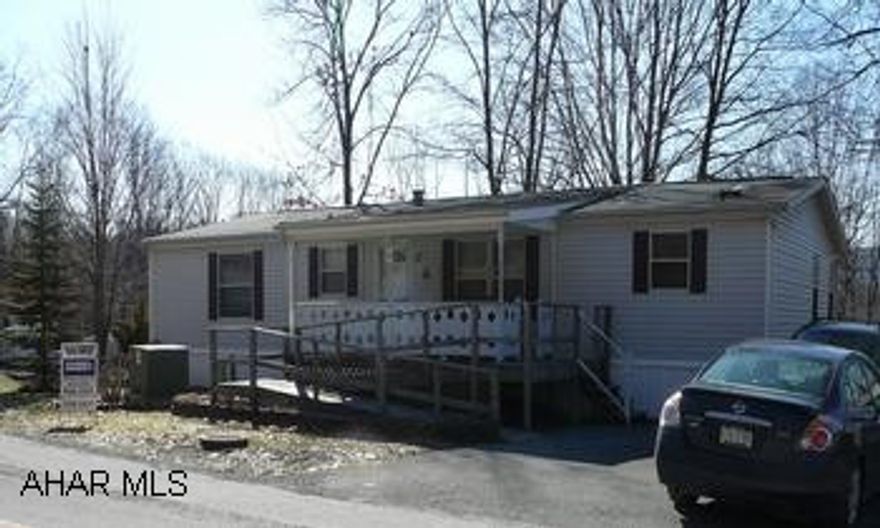 1996 CHAMPION 32 BY 56 DOUBLEWIDE ON CORNER LOT WITH OFF STREET PARKING. LOT RENT OF $290 COVERS SEWER & TRASH. FIVE HUNDRED DOLLAR BONUS TO SELLING OFFICE IF CLOSED BEFORE JUNE 1, 2010. 1996 CHAMPION 32 BY 56 DOUBLEWIDE ON CORNER LOT WITH OFF STREET PARKING .LOT RENT OF $290 COVERS SEWER & TRASH.  FIVE HUNDRED DOLLAR BONUS TO SELLING OFFICE IF CLOSED BEFORE JUNE 1, 2010.