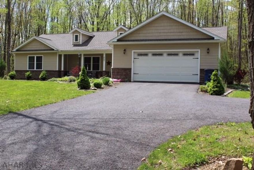 Escape to your secluded haven in the woods!! This remarkably maintained ranch home custom built in 2016 is located on 2.584 acres at the end of a private road. The spacious foyer leads to the open concept living area.  Kitchen features granite counters and stainless steel appliances. Laundry room off kitchen.   Master bedroom with ensuite bathroom and walk-in closet.  Two additional bedrooms and a full bath located on the opposite side of the home.   The beautifully landscaped patio complete with a built-in fire pit is PERFECT for entertaining and relaxing!  The spacious unfinished basement is ready for you to make it your own!  Conveniently located to schools and necessities.  20 min. to Historic Downtown Bedford/15 min. to Shawnee Lake/20 mi. to Blue Knob Ski Resort.