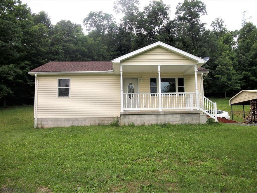 This is a well-maintained, ready to move in ranch home that was built in 2014.  Nice open floor plan with oak kitchen cabinets and oak trim-work throughout. Resting on a full walk-out basement with a wood burning stove, electric BB heat, pex piping, & 200-amp electric. Nice private setting with 7.728 acres of rolling woodland, but close to town. Within 15 minutes of Interstate 70 and PA Turnpike. Large, heated, detached two-car garage, two-car carport and a 14 ft x 20 ft pole building.