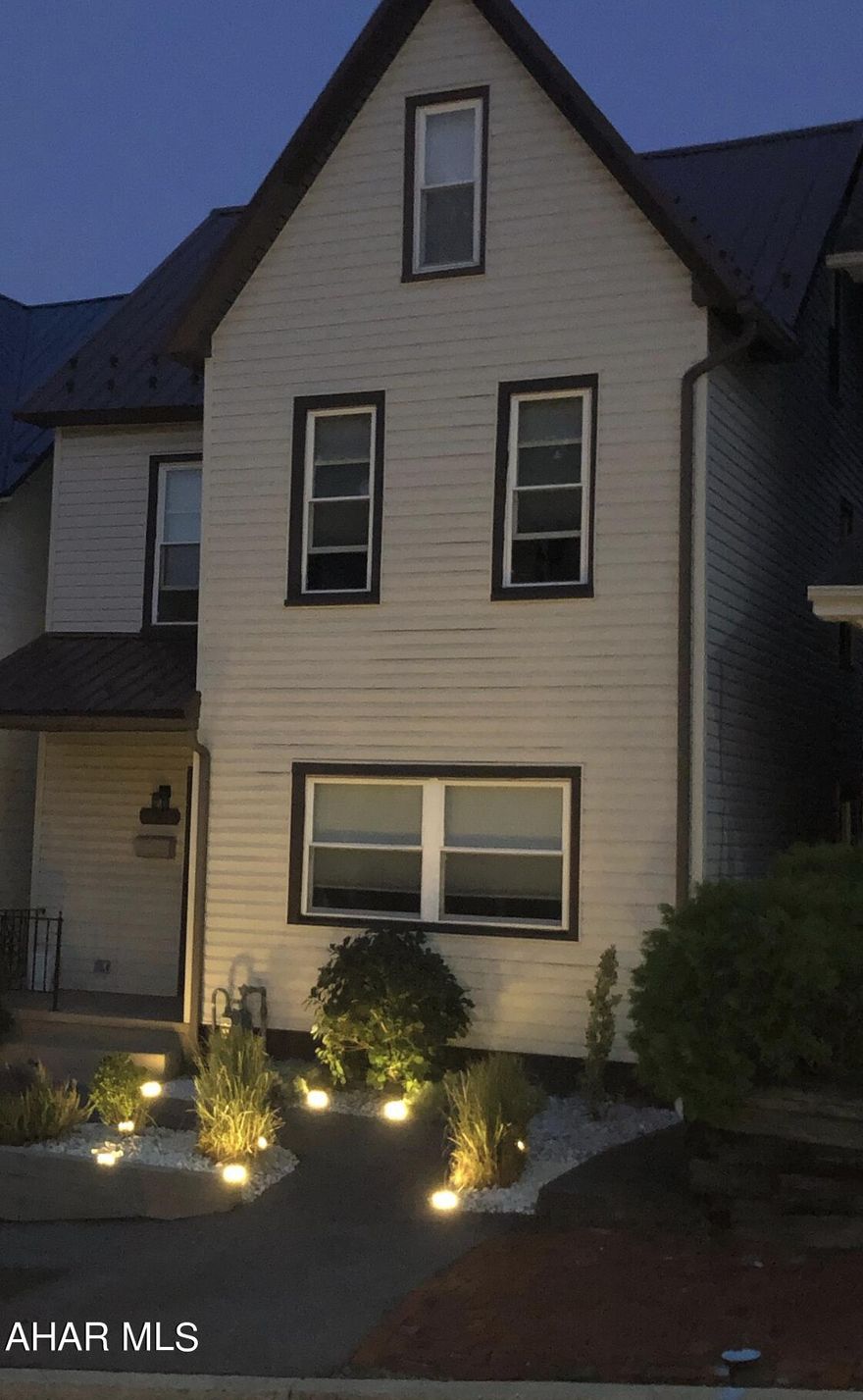 You will be impressed with this well maintained and nicely updated 2 bedroom, 2 full bathroom home. The first floor offers an eat-in kitchen, a dining room, a living room, a laundry room, and a full bathroom.  The second floor has 2 bedrooms and a custom 3/4 bathroom.  The third floor has 2 finished rooms, but they are not heated.  You could put electric baseboard heat on the 3rd floor and use it as a nice-sized 3rd bedroom.  You enter the 3rd floor from the 2nd-floor hallway.  The backyard is fenced with a chain-link fence.  The fence on the left and along the back of the property belong to the seller. 
The fence on the right belongs to the neighbor.  Must see to appreciate.  Please call to schedule your personal tour.