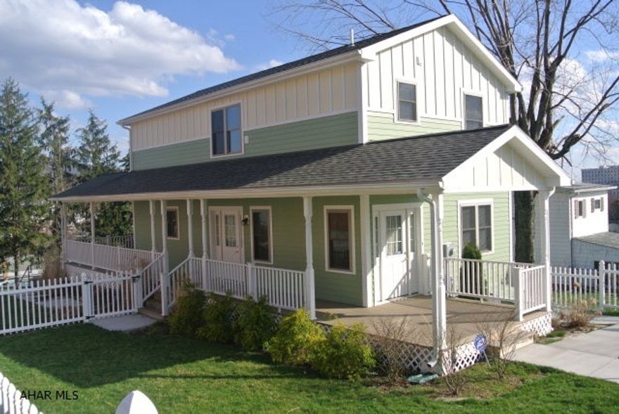 Its Almost Brand New!!!  Built in 2010 and very well Kept.  This beautiful home has outstanding features.  It gives you 3 to 4 bedrooms with many walk-in closet areas throughout.  The interior looks virtually brand new.  The bathroom and kitchen flooring are the exquisite tile-like Pergo. It's open from Kit to living area, Huge closets,CENTRAL A/C, 2nd flr laundry and an outstanding wrap out covered deck with the maintenance free composite decking.  You also get a quaint fenced in yard with Vinyl Fencing.  Off street parking for 2+ cars....need I go on?Well....it even has full ceiling height in the basement,AND....it is already insulation(So it won't take much to finish).This home is probably the best priced home in its range.  The street view is surrounded by many nice homes. Drive by!