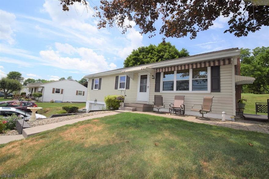 Move right into this well maintained home with remodeled kitchen and bath.  Hardwood floors under carpeting.  Economical heat pump for heat and AC.   Nice area in basement for that extra living space needed for hobbies, kid's gaming, etc.   Good storage.   Nice deck and large yard.  One car integral garage. Retractable awning above front outdoor veranda.   All mechanical systems in excellent condition.