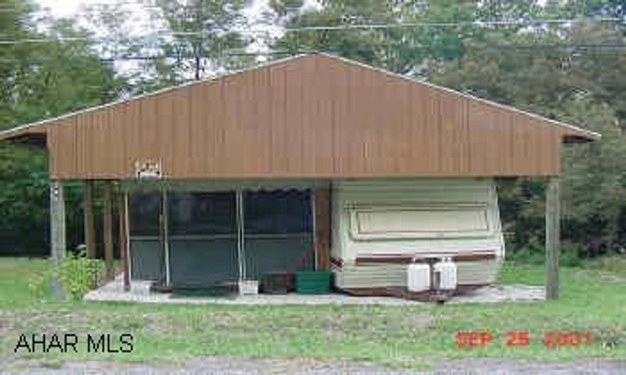 32 Citation Camper with full pavillion on  level lot in Glendale Yearound with screened room, Air, many extras all in mint condition. Camper is like new  with screened room under full pavillion, Air and many extras on nice level lot.  Motivated seller