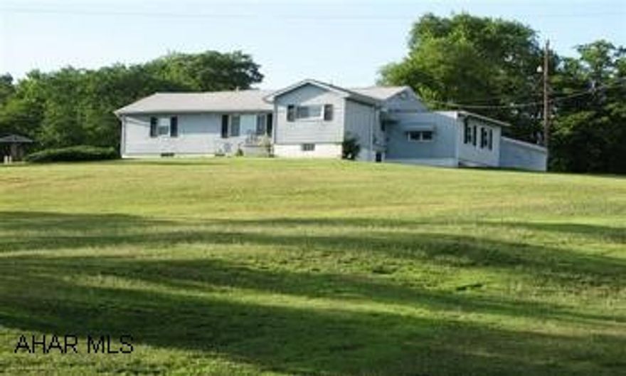 What a view on over an acre of ground.  This 1 story country home is just waiting for you.From Rt 22 turn onto Reservoir Rd, left at DeGol Lumber onto West Loop Rd, half mile past red barn turn right onto Skyview Dr & follow to blue rancher on hill.