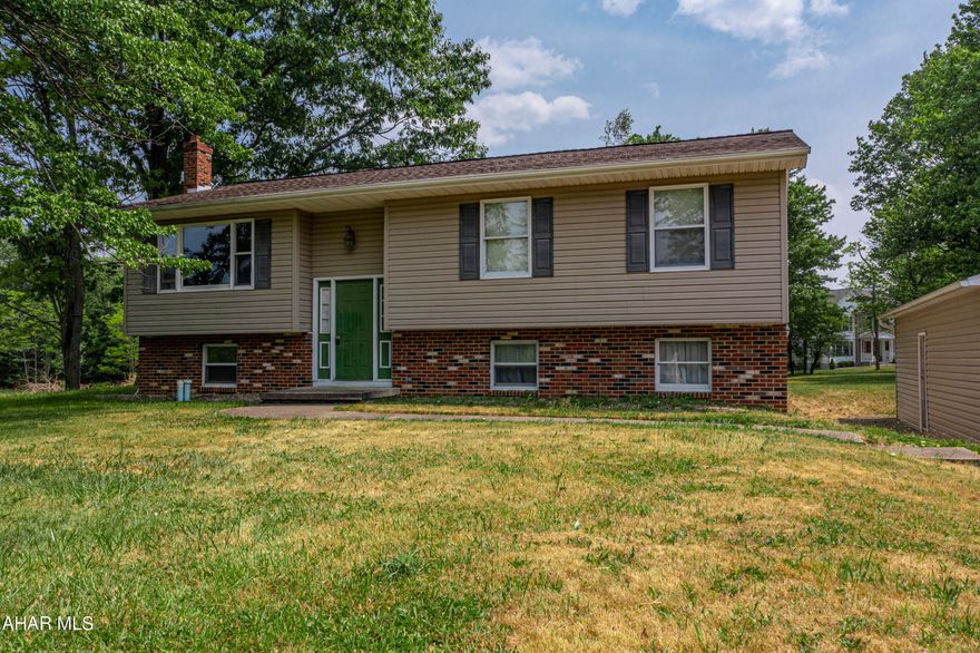 Spacious split level, 3 bedrooms, 2 bathroom home situated on almost 4-acre lot in Houtzdale.  This home features a walkout basement, 2 car detached garage and rear deck.  Lower level has a family room, full bath, and a bonus room that could be used as a 4th bedroom.  Public water and sewer.  Check out the Matterport virtual tour and schedule your showing today.