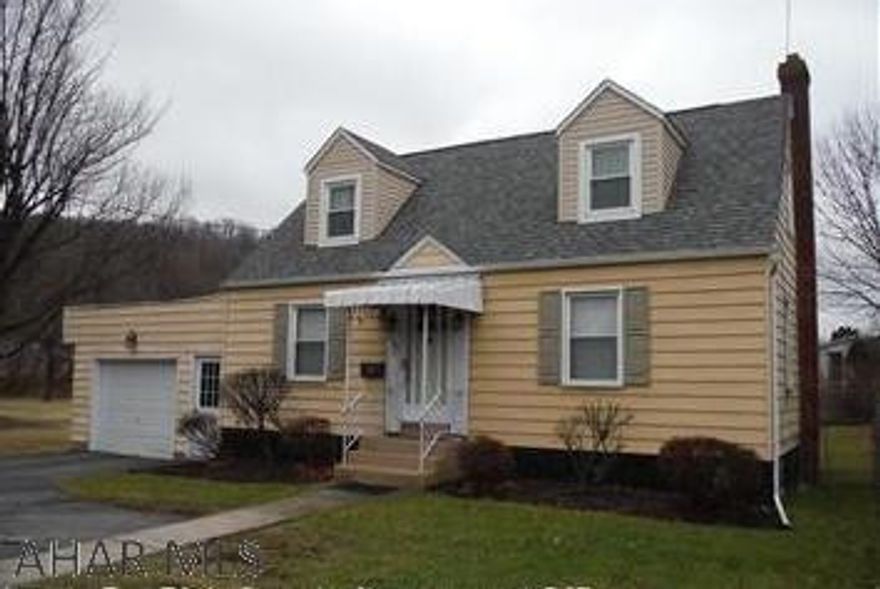 This adorable home features 2-3 bedrooms, and the eat-in kitchen includes the appliances!  Beautiful hardwood floors and a huge second story that is finished!  Oversized one car garage and fenced yard.  Screened patio.  Priced to sell!