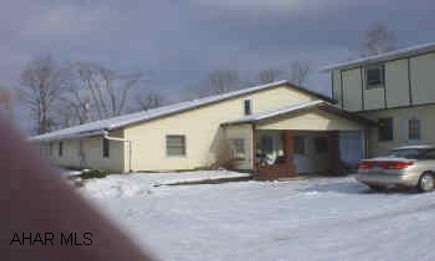 8 FURNISHED APARTMENTS AND 3 TOWNHOUSES ON A LOT SIZE 64 X 300.  FIREPLACE LOCATED IN ONE APARTMENT.