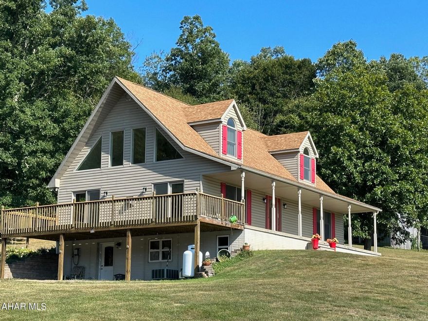 This cape cod home offers a Main Fl Master suite with master bath, double sink, large walk-in shower, walk-in closet, garden tub. Half bath off mudroom. Open concept kitchen, dining, and living room, large windows, cathedral ceilings and french doors to the side deck. Beautiful stone gas fired fireplace.  From the large side deck you can enjoy watching wildlife run through the fields and pastures any time of the day!  The 2nd floor offers a loft/den, 2 bedrooms, and a Jack & Jill bathroom.
Covered front and back porches and a 2 car carport and 3 car detached garage.
The basement is finished and set-up as a Mother-in laws suite, with a full kitchen, living room, den, dining room, bedroom, full bath and laundry.  Lg. storage room with fire proof door! Barn for animals with 3 stalls and electric., storage up to 300 bales of hay. Multi pole barns on the property.