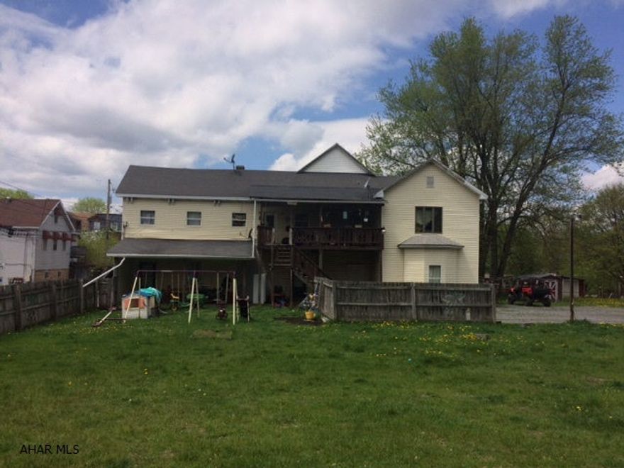 Good income producing property.  Fully occupied.  Apt #1 has been completely renovated.  Additional space in what was the old bar area could be converted into addition living quarters.  Close to town and walking distance to college.  Priced to move quickly.