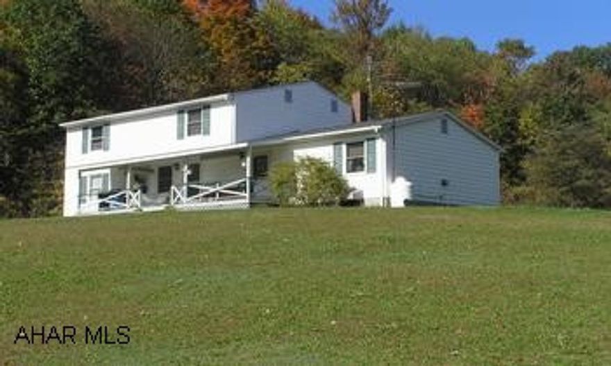 3 Units fully rented with separate utilities on 12.9 acres.  Fuel type is electric and propane.