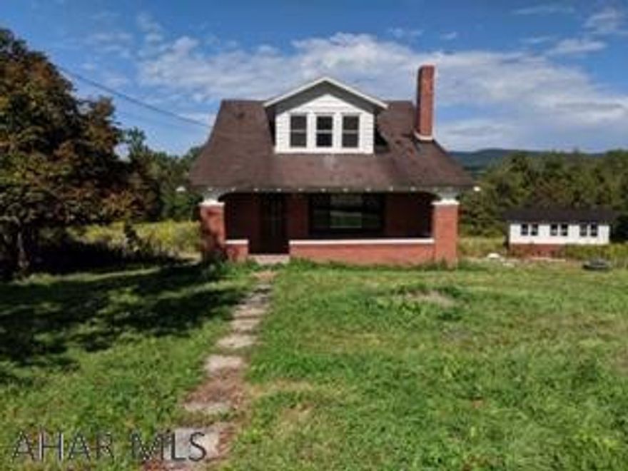 Gentleman's Farm - 1 1/2 Story Cape Cod, brick exterior.  3.025AC with 40 x 60 Barn and additional outbuildings.  Fenced pasture.  This property is being sold "AS IS"