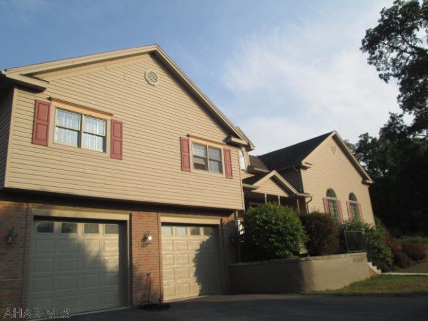 Large 4 bedroom home, with lots of potential! Home is located at the end of a private lane with a fenced in backyard. Features large bedrooms and living space, also includes a detached garage.  Buyer to verify square footage and real estate taxes.  A diamond in the rough, lots of square footage for the price with some work, you can enjoy some sweat equity.  Home has been priced accordingly for the necessary improvements that are needed.