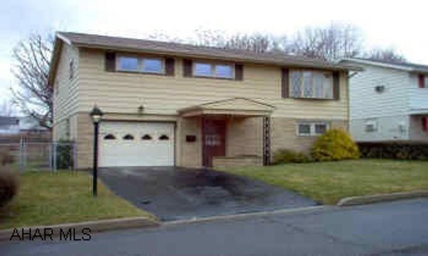 Well-maintained raised ranch in Pleasant Valley.  All levels above grade with an integral garage.  New windows with the exception of living room bow window.  Covered rear deck off dining room.  Frosted maple cabinets in kitchen.