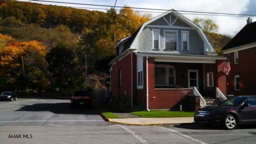 Well maintained, brick, 2-story home on a corner lot.  New baseboard boiler system (6-7 yrs. old).  Low heating bills.  New roof in 2010.  New copper plumbing.  Newer windows.  Hardwood floors under carpeting and plywood.  Flood ins. quote on file.