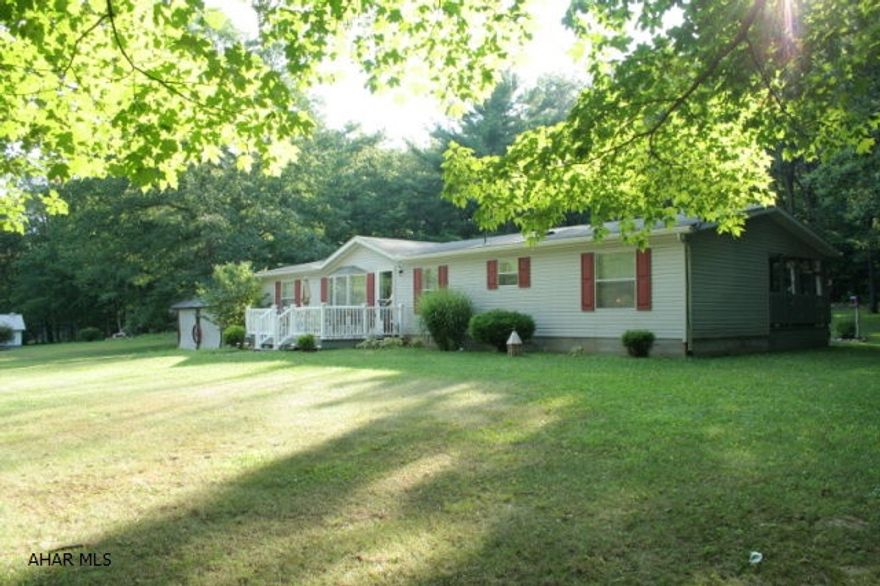 Immaculate and inviting are just two words to describe this comfortable, one story living home. Set on over 4 1/2 acres with woods and a seasonal stream, this home is what you have been searching for . With a family room and living room you will have plenty of space to entertain family and friends. A covered porch located off of the family room is a great place for early morning coffee or evening relaxing. This home boasts of a bright kitchen with center island and eat in dining room. Full, walk out basement could be finished to add even more living space. A large detached garage and several outbuildings provide excellent storage. You do not want to miss this gorgeous property!