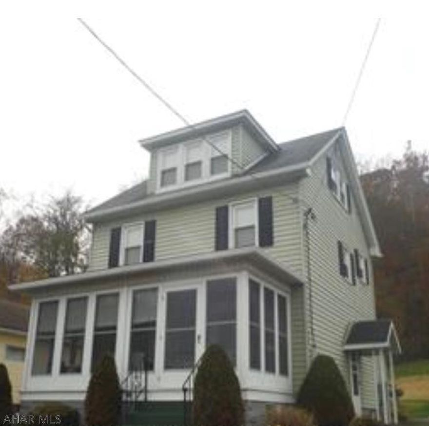 Well maintained home in Williamsburg.  Updated mechanics and roof.  2 car detached garage and oversized lot. 1st floor has bonus room, enclosed porch.