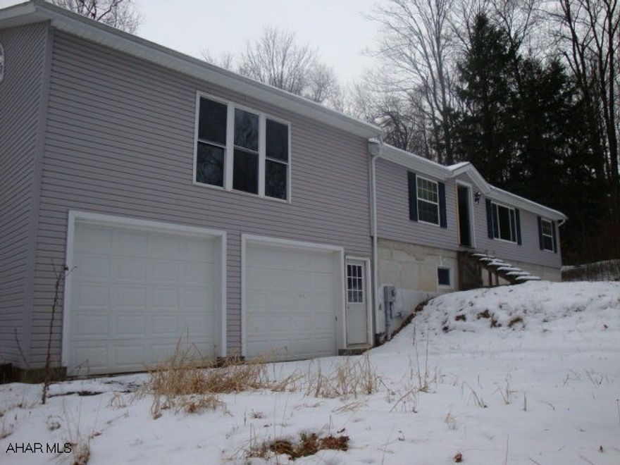 NO FURNACE and NO HOT WATER HEATER. Lots of potential, doublewide on a full foundation, integral garage with additional living space above it, master bedroom with walk-in closet and full bath with whirlpool tub, oak kitchen, Minimum earnest money deposit must be $1000 or 2% of contract price, whichever is great, to be paid by cashiers check or certified funds payable to Colony Realty Group, LTD.  There are Homeowners Association fees of $413.10 for 2011, billed in 3 installments.