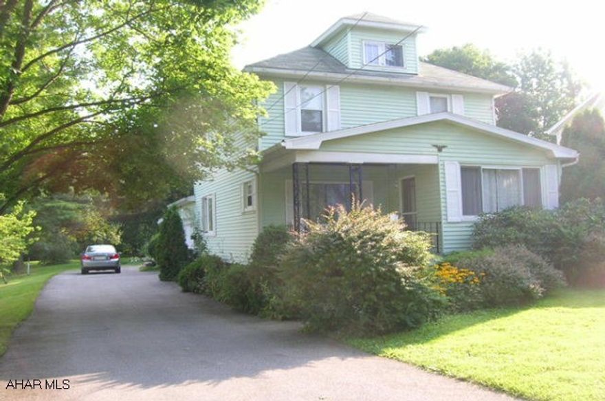 Additional lot with home in far rear of property.