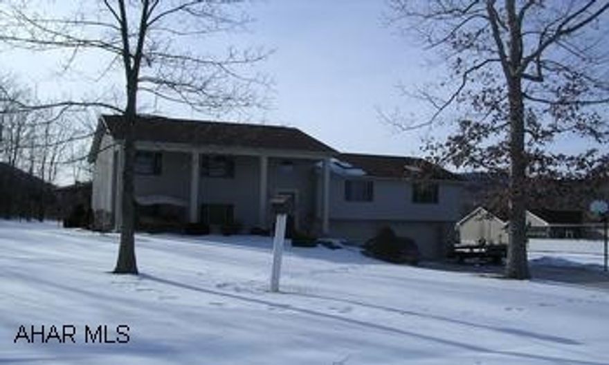 TRI-LEVEL HOME WITH 2 CAR INTEGRAL GARAGE. BEAUTIFUL PRIVATE SETTING FOR THIS LOVELY 4 BEDROOM & OFFICE. 3 LEVEL HOME. BEAUTIFUL OAK THROUGHOUT. HUGE LR, LARGE EAT-IN KITCHEN, LOVELY LOT. ELEC. HEAT PUMP W/OIL BACKUP.