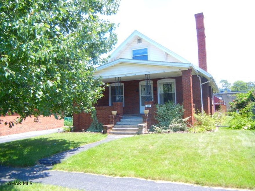 Solid brick home on dead end street that minimizes traffic.  Newly paved street.  Covered front porch.  Large living room/dining room combo with fireplace for cozy reading or dining.  Built in bookshelves and wall AC.  Kitchen has plenty of cabinets and a dining area that accesses an enclosed back porch and deck in the rear.  Second floor features 2 bedrooms separated by a walk-in closet.  Partially finished family room in basement with half bath and cedar closet. New hot water tank.  Fenced back yard with shed for extra storage.  Paved driveway goes through 2 car carport to alley.  Baker School Elementary.