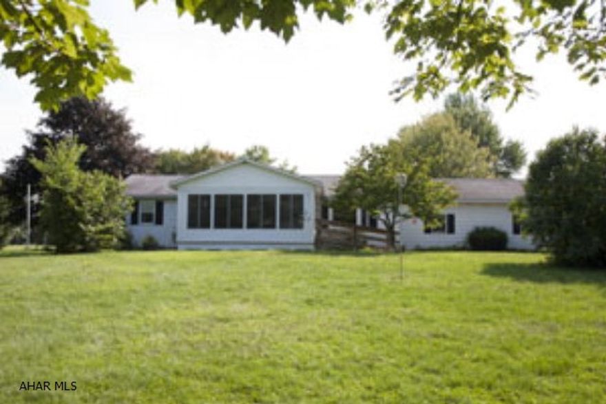 A great one-story home. Located within minutes of the CR schools and other area amenities yet is set off by itself and offers privacy. Recently updated kitchen with granite counter tops and new cabinets; updated bathrooms; a large attached 2 car garage; new roof in 2003 new double and triple pane windows and a spacious sun-room. The house is currently handicapped accessible but ramps could be easily removed at new owners discretion. This is a well maintained home and priced to sell.