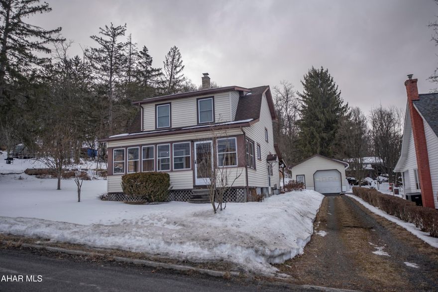 Move in ready 2 BR 1.5 BA  cottage style home located in a quiet neighborhood.              Beautifully remodeled within the last few years. The first floor has all new drywall ,new kitchen counter tops, new flooring throughout house, updated bathrooms, ceiling fans installed, central air, heat pump, water heater ,new windows, new back porch roof and water softener. Detached garage with lots of extra space and cabinets for workshop. Large rolling back yard with 2 sheds.