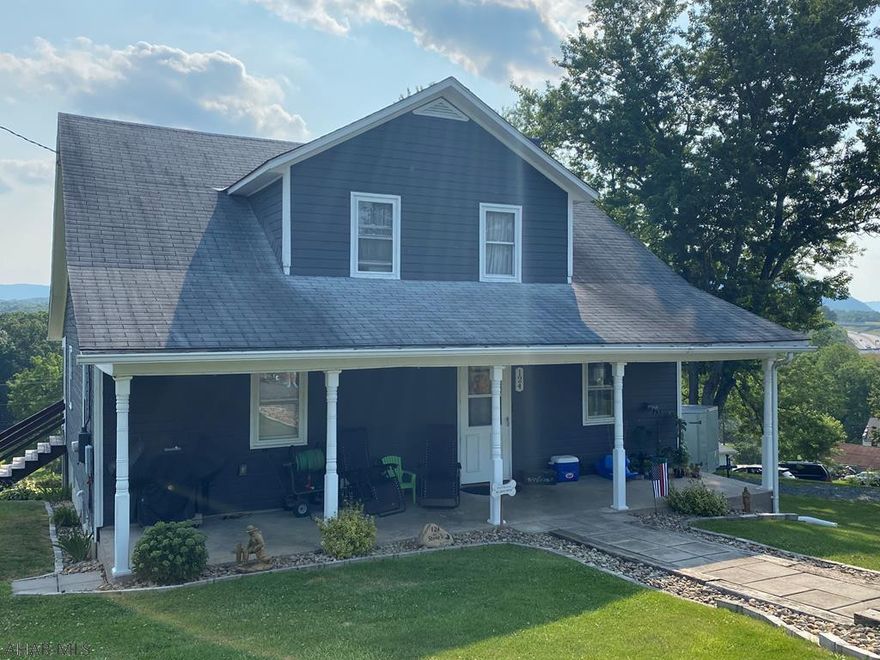 Move-in ready two story just minutes from town. Situated on a quiet street with yard space just shy of an acre that features a grape arbor, plum and apple trees. Open kitchen with eat-in space and custom oak island. First floor laundry and recently remodeled full bath. Huge open living room and dining room area. Second floor features two large bedrooms with potential for extra living space. Master has spacious walk-in closet and 11x8 bonus room which could be third bedroom, nursery or office. Second bedroom has two walk in closets, the largest being 8x5. Second floor also has a full bath. Partially finished basement for even more living space. Home has Kinetico water filtration system and whole home surge protector system. Single-wide on property would be a perfect rental or in-law suite!