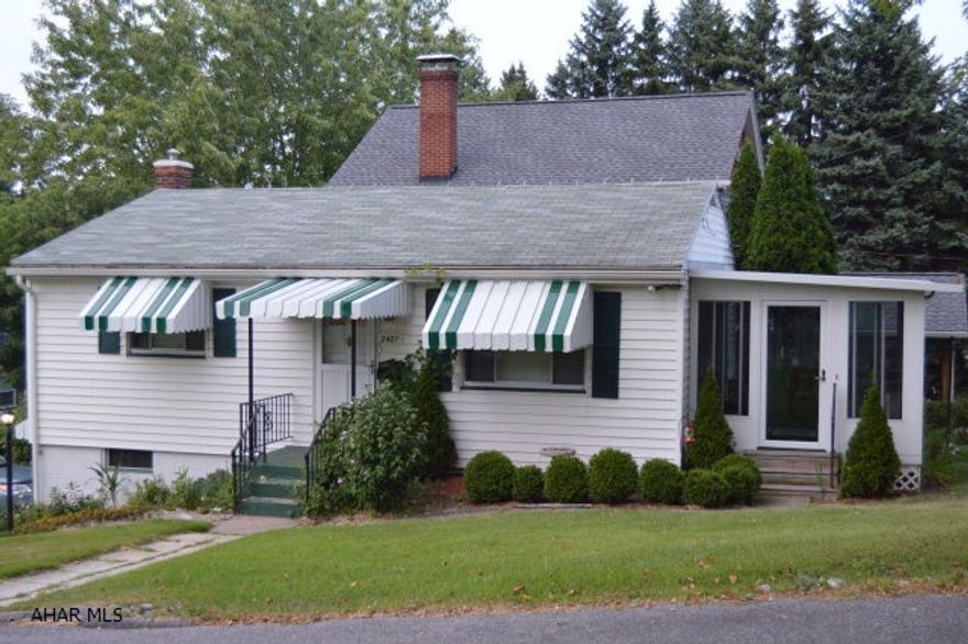 Charming home resting on a large corner lot. This home is in a great location. It has 2 bedrooms, 1 bath and a 1 car garage. Beautiful sun-room overlooking the spacious back yard.