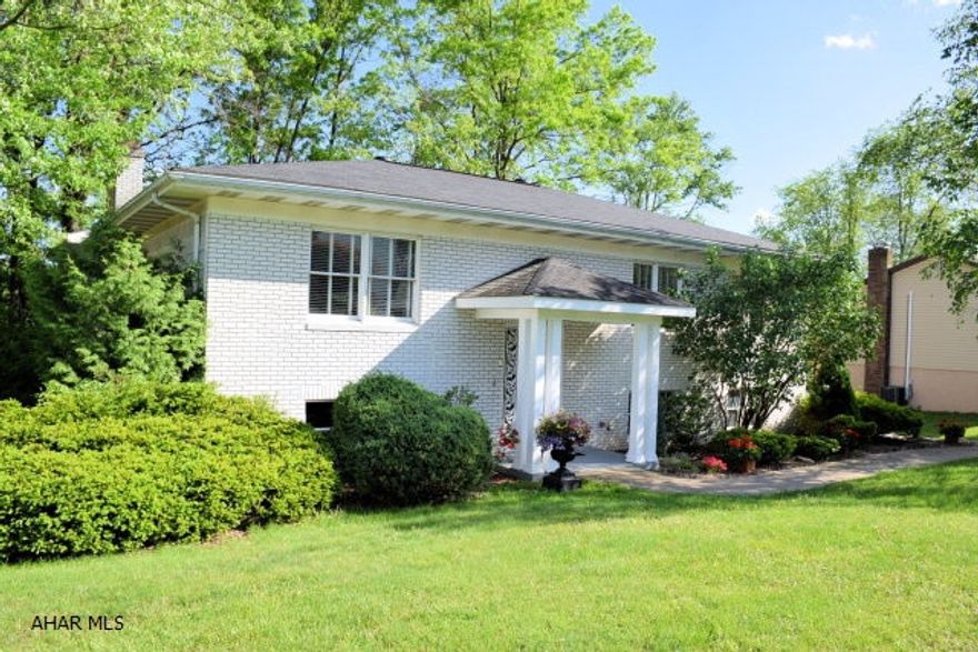 Beautiful curb appeal and stunning interior.  Huge family room addition on main level leads to private and secluded rear deck.  Lower level features another family room with gas fireplace, possible 4th bedroom, 1/2 bath and laundry.  One of Hollidaysburg's prettiest neighborhoods.