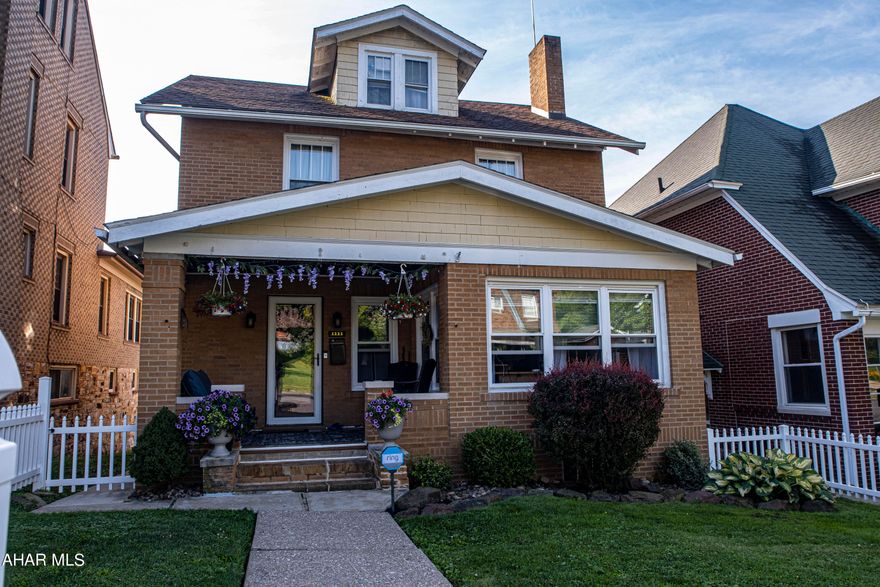 Step inside this impeccable, spacious, all brick, 2 story home located in Calvert Hills! Featuring a brand new kitchen with soft-close cabinets and drawers, new counter tops, grout less backsplash, motion censored under-the-cabinet rechargeable lights, and new Mohawk vinyl flooring throughout the  first floor! With the kitchen being open to the living room, the open concept provides such an inviting space! Enjoy winters warming up in front of the wood burning fireplace! Original hard wood floors compliment the second floor hallways and bedrooms, with a cedar lined linen closet beside the main bathroom. Use the finished third floor as a 4th bedroom, office, or play room! Off street parking out back with a carport large enough for 2 vehicles provides cover from all elements of the weather! The above ground pool has a new liner, with gas heater which makes for a perfect oasis, anytime, all summer long!