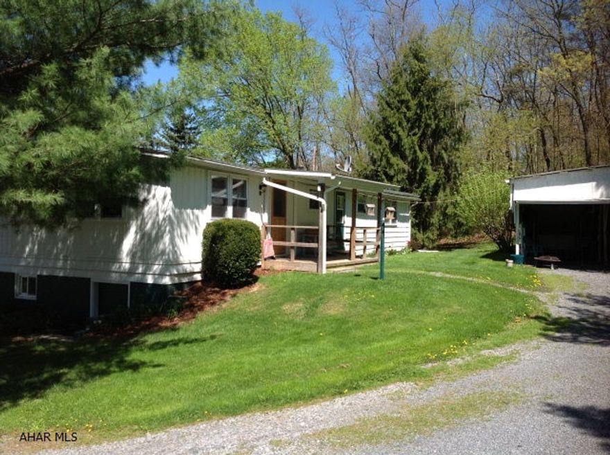 Nicely maintained doublewide home on a full foundation on .5 acre with beautiful views of the mountains and fields. 40x40 detached pole 2 car carport. Newer windows and doors.  Only 2 miles to Shawnee State park where you can walk, hike, bike and fish and canoe and much more. Within 1 mile of the Juniata River. Nice location and private.